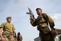 Судебный пристав из Тувы Айдын Куулар завоевал зеленый берет и получил именные часы от руководителя Службы